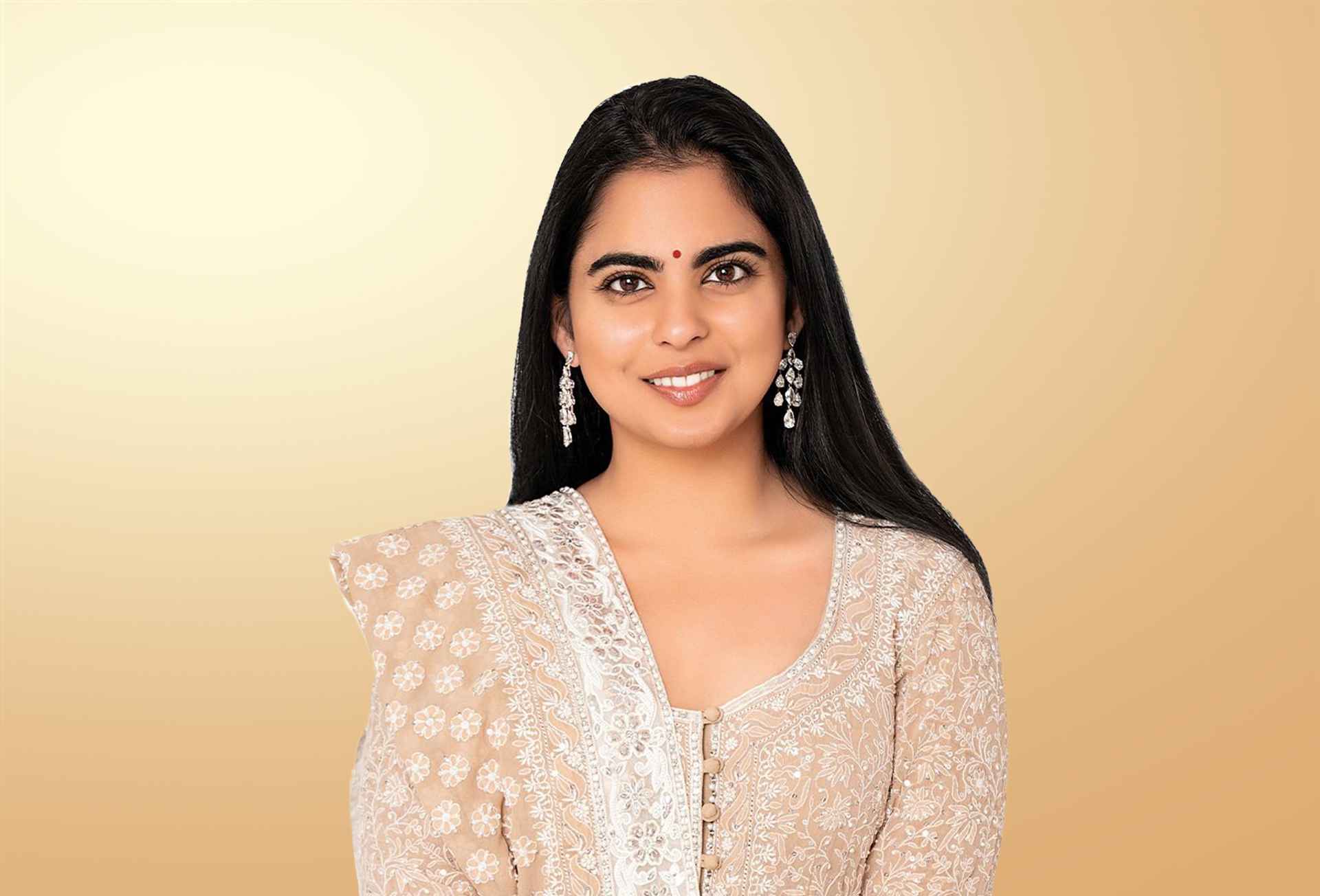 Isha Ambani delivering a heartfelt tribute to her mother Nita Ambani during the Icon of the Year award ceremony, celebrating women's achievements in business.